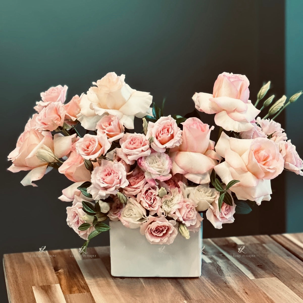 Exquisite pink rose bouquet at Luxury Florist in Livonia, MI – vibrant roses with lush greenery perfect for special occasions.