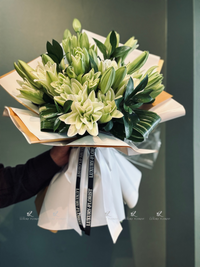 Exquisite White Lily Arrangement Delivered