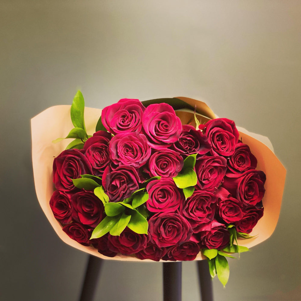 long stem red roses wrapped